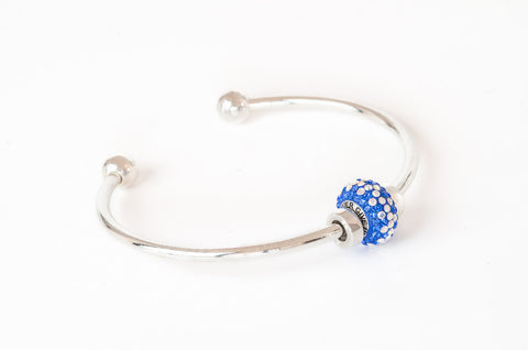 Never Give Up bead on silver bangle bracelet