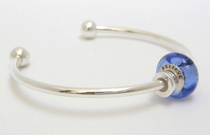 Believe bead on silver bangle bracelet