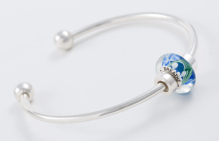 Breathe bead on silver bangle bracelet