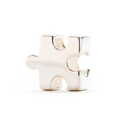Sterling silver puzzle piece charm