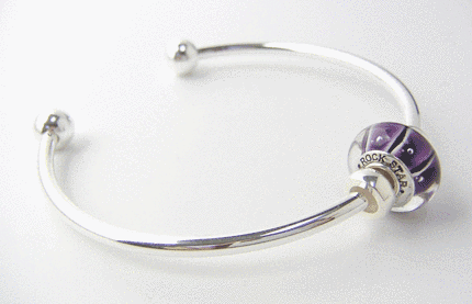 Rock Star bead on silver bangle bracelet